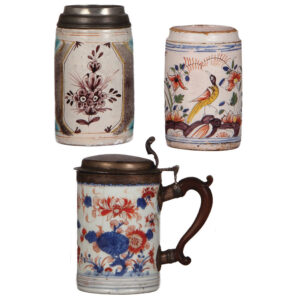 Two faience & a porcelain stein, 5.5" to 7.2" ht.
